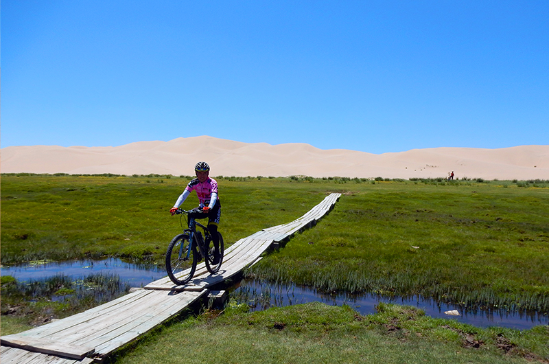 Cycling in near Khongor sand dunes in Mongolian Gobi